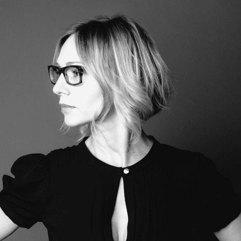 Portrait of Sanda, a professional stylist at Maxine Salon, showcasing their expertise and style.